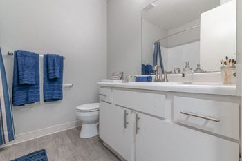 Modern bathroom with framed mirror